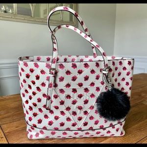 Red and white GUESS tote.